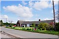 Bungalows opposite Broad Oak Farm