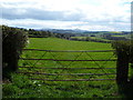 View from a green lane towards Porth-y-morddwr farm