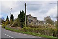 The side view of Peakstones Inn on the B5032