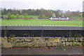 Benchmark on Gregory Boulevard wall opposite Foxhall Road