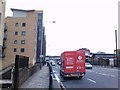 View of the Limehouse Station railway bridge from Commercial Road