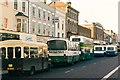 NZ4419 : Bus wars in Stockton High Street (1988) by Graham Hogg