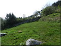 White cottage on hillside