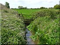 Drain at the bottom of the railway embankment