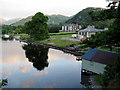 Inn on the Lake with a boathouse in the foreground