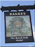 SO5968 : Faded sign at the Royal Oak by John M