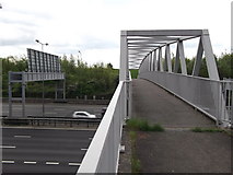 TQ2953 : Footbridge over M25 near Merstham by David Anstiss