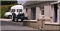 Tractor parked outside California Cottage