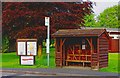 TQ0053 : Notice board, bus stop and bus shelter, Jacobs Well Road, Jacobs Well by P L Chadwick
