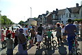 Newport: crowds wait at the bottom of Waterloo Road for the Olympic Torch relay