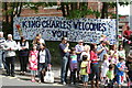 A colourful banner at King Charles School in Falmouth to welcome the Olympic Torch