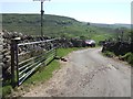 Opened gate on the road to Knar