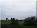 View from the M25 across farmland towards Whitewebbs Lane