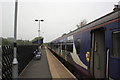 NY8464 : Carlisle to Newcastle train at Haydon Bridge station by Roger Templeman