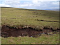 NH0960 : Peat bank east of Allt a' Chon'aigh above Loch a' Chroisg by ian shiell
