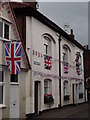 Flag-bedecked Shere