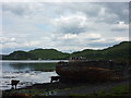 NM8127 : Coastal Argyll : The Old Boat at The Little Horse Shoe, Island Of Kerrera by Richard West