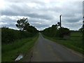 SK9787 : Normanby Cliff Road heading west towards the A15 by JThomas