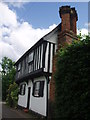 Timber framed house bordering the green St Ippollytts