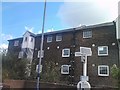 View of the Rainham Oasthouse and Community Centre from a Southeastern High Speed train at Rainham station