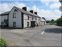 J0411 : Paddy O'Hagan's Public House at Marmion's Cross Roads by Eric Jones
