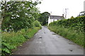 Approaching cottages on the narrow lane at Pen-y-bont