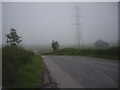 Power lines crossing minor road