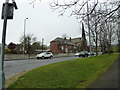 Looking across the A61 towards a church spire