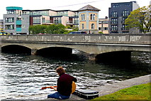 M2924 : Galway - Musician, River Corrib, Wolfe Tone Bridge by Joseph Mischyshyn