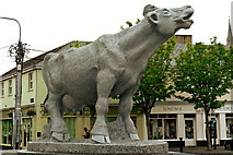 R3377 : Ennis - Market Place - Statue (Cow) & Sonoma Shop by Joseph Mischyshyn