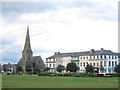 NY1053 : Houses and businesses facing Silloth Green by Graham Robson