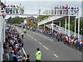 SZ0894 : Ensbury Park: people line Boundary Lane ahead of the Olympic torch by Chris Downer
