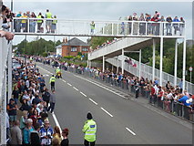 SZ0894 : Ensbury Park: people line Boundary Lane ahead of the Olympic torch by Chris Downer