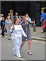 TQ8209 : Torch bearer, Day 61 Olympic Torch Relay by Oast House Archive