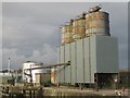 NY1053 : Rusting storage silos, Port of Silloth by Graham Robson