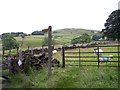 Public footpath sign at Harrop Cote Farm