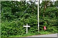 Direction sign and postbox near High Hurstwood