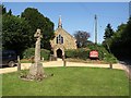 War memorial and St James