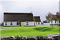 M2208 : Irish Cottages (close-up), Ballyvaughan, Co. Clare by P L Chadwick