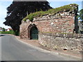 Walls and Norman-arched entrance to Lindores Abbey