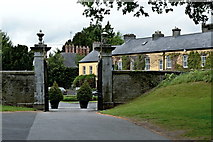 R4646 : Adare - Main Street - Entrance to Adare Manor Grounds by Joseph Mischyshyn