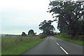 A873 approaching bend adjacent to Burnbank Wood