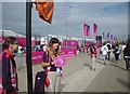 Directing spectators at the Olympic Village entrance