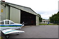 NH7651 : Aircraft hangar, Inverness Airport by David Martin