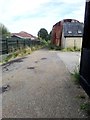 Footpath running alongside rail lines