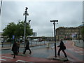 Pedestrians crossing Victoria Street