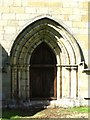 NY8773 : St. Mungo's Church, Simonburn - door in south wall of chancel by Mike Quinn
