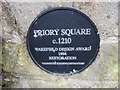 The plaque at Priory Square, Walton