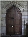 NY8773 : St. Mungo's Church, Simonburn - south door in chancel by Mike Quinn