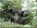 House hidden by trees